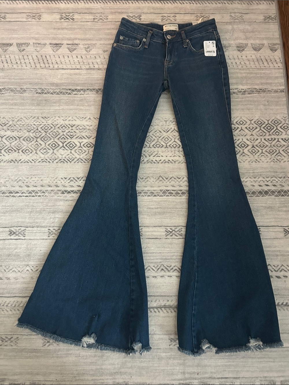 Free People Indigo Flared Denim Jeans with Raw Hem